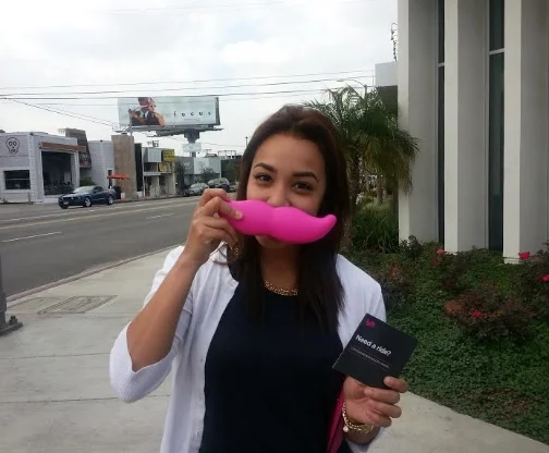 Repping Lyft in Los Angeles, street team members passes out Lyft referral cards at The Grove.