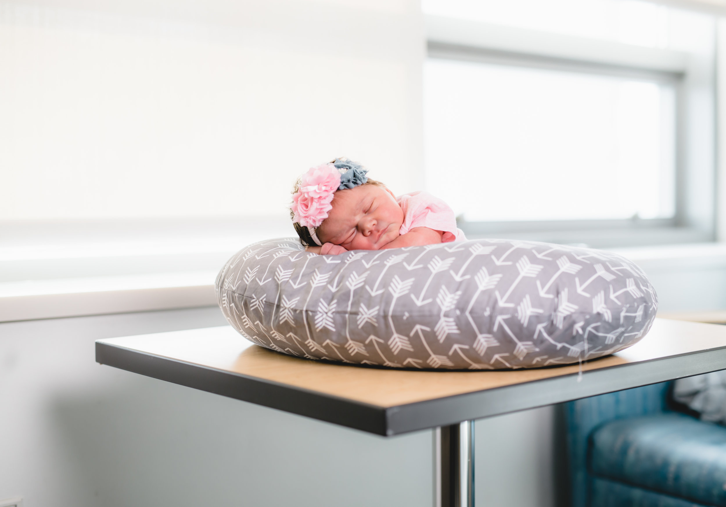 Little girl chilling on the table to give you an idea of how small she is.
