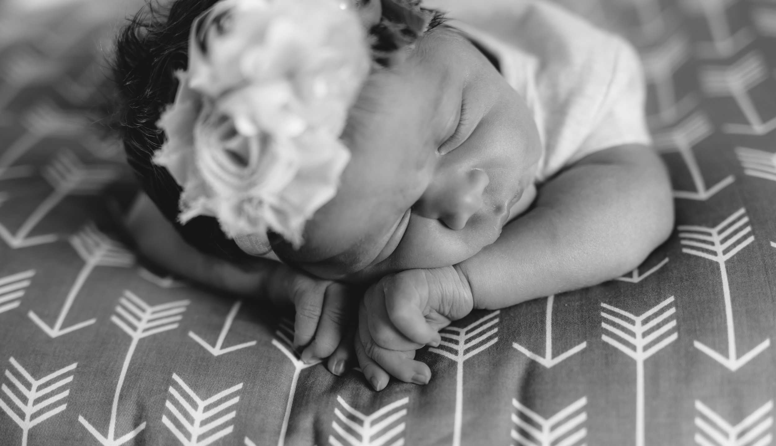 Sleeping....this is what most newborns do....they sleep...