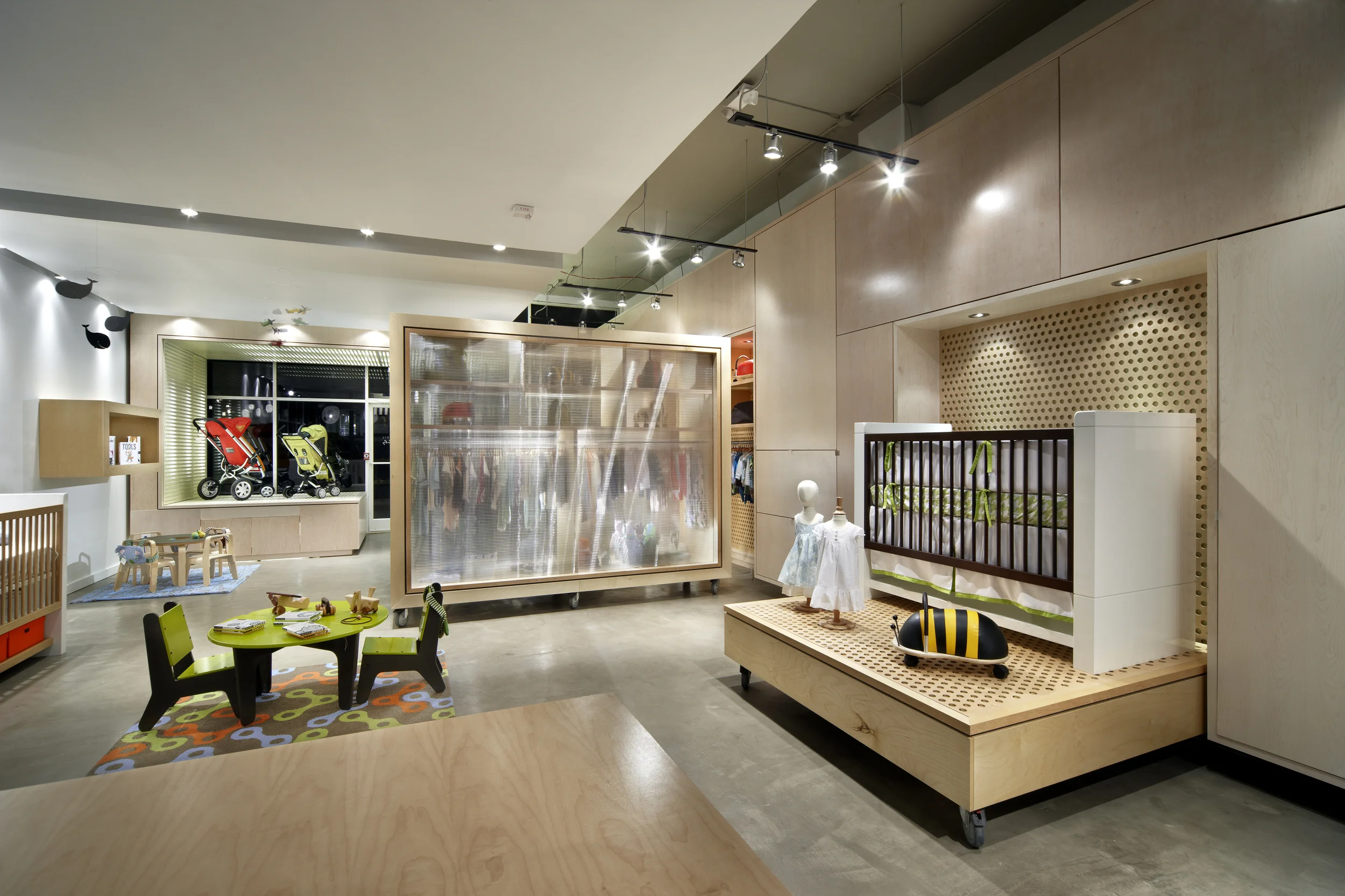 Benie + Cecil baby Raleigh, North Carolina Architect: HA Program: 1,100sf (110m2) retial space located in Cameron Village shopping center, Raleigh’s oldest retail complex. Like a child’s 3D puzzle, all of the display units and platforms are mobile, allowing a range of layouts in this existing retail shell. Client: Benie + Cecil