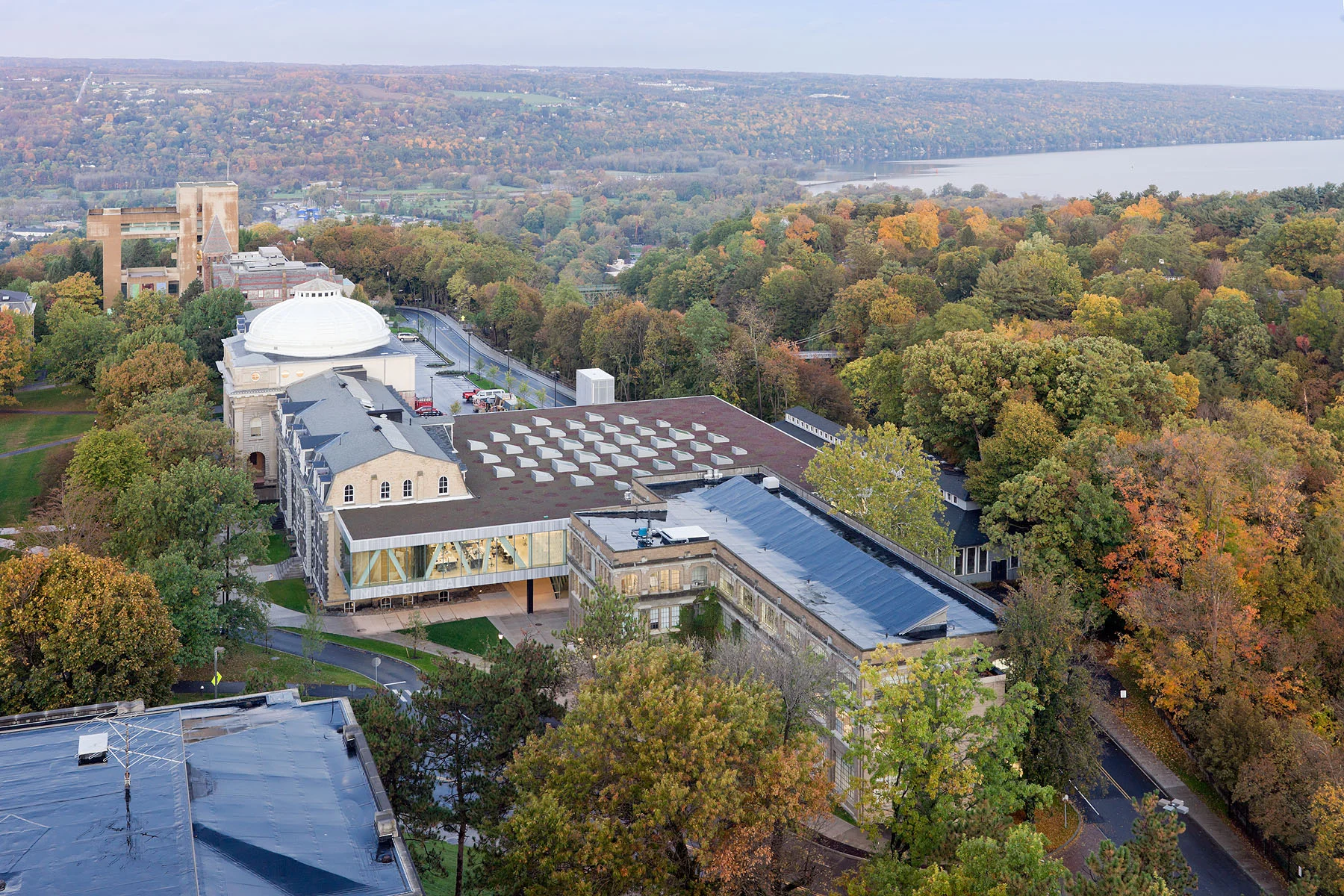 Milstein Hall Cornell University Ithica, New York Architect: OMA Patrick Hobgood, Designer Program: 42,500sf (4,250m2) extension to College of Art, Architecture, and Planning at Cornell University. The addition includes an Auditorium, Crit Space, Exhibition Gallery, and Studio Space. Client: Cornell University
