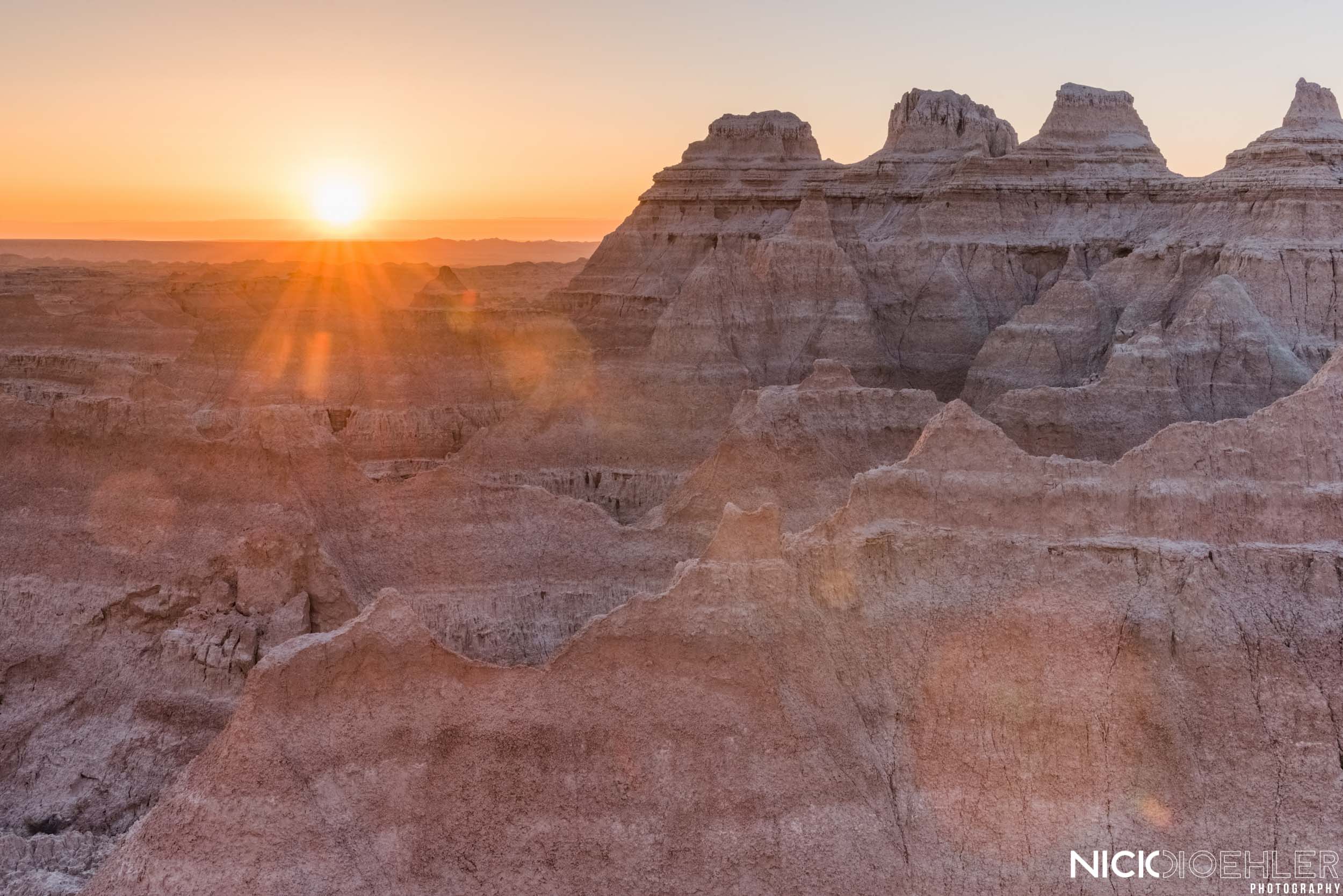 Badlands National Park: Sunrise right above all the beautiful scenes in Badlands National Park.
