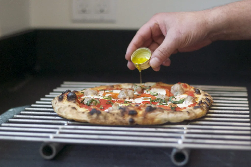 The Secret To Perfecting Sausage Pizza Baking Steel