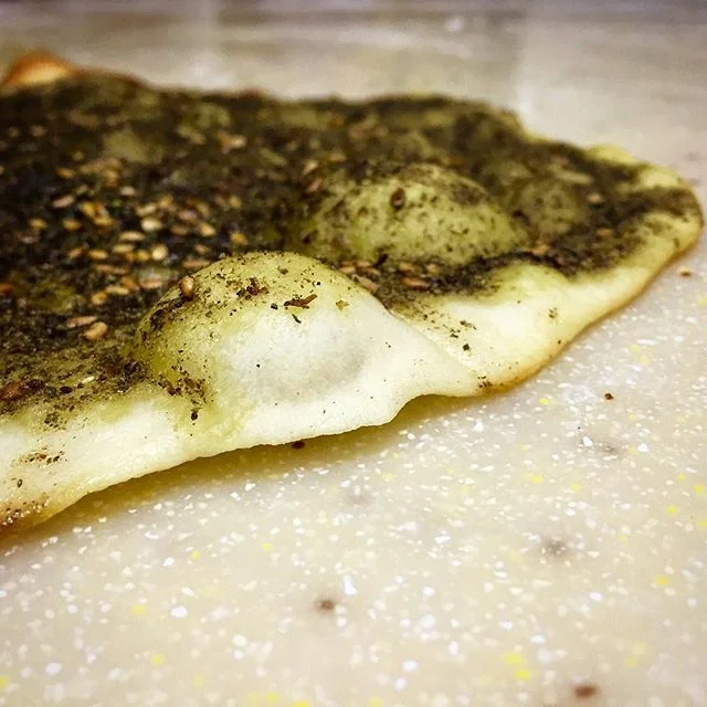 A lovely za'tar flatbraed fresh out of @farahskitchen .