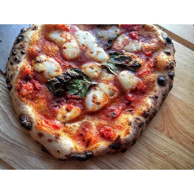 @alongcamepizza working on his new dough. Looks good to me.
