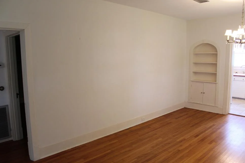 Before- Wall Between Dining and Living Room Matthews.jpg