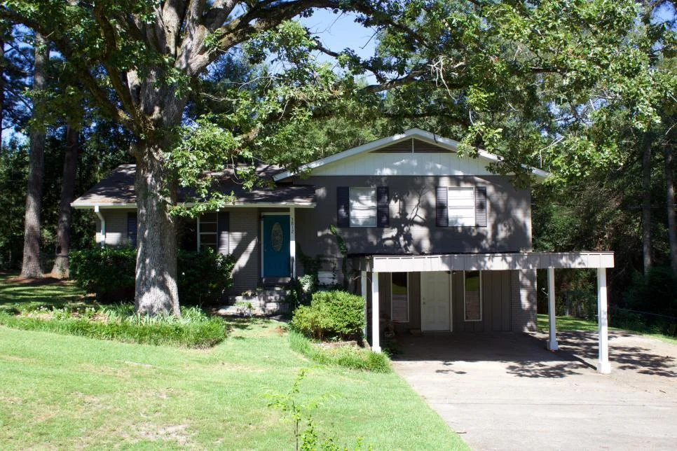 Before- Exterior Front View M. Trest.jpg