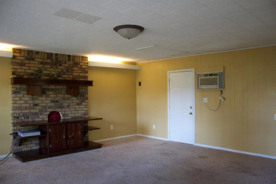 Before- Living Room Door to Exterior M. Trest.jpg