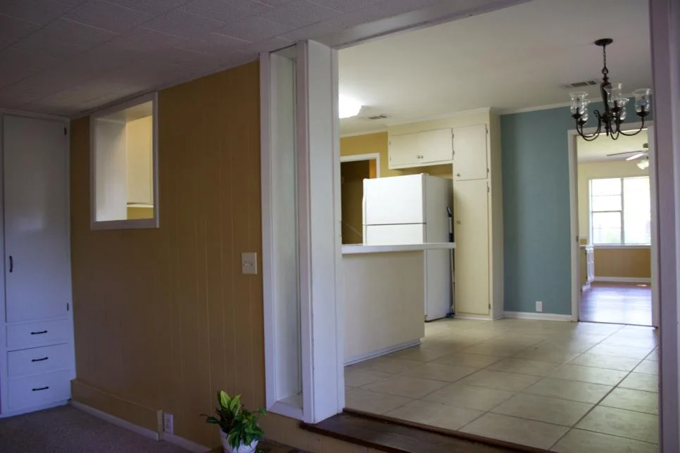 Before- Living Room to Kitchen from Steps M. Trest.jpg