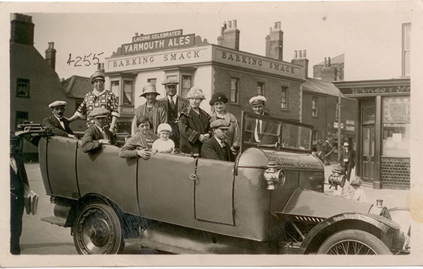 11 July 1926 "Your Aunt Lizzie and I just leaving Yarmouth for Newmarket". Taken at Great Yarmouth Gorleston-on-Sea in front of the Lacons Celebrated Yarmouth Ales Barking Smack. Alice is in the back row, second from right. Next to her is her brother William's wife, Elizabeth Thomas.