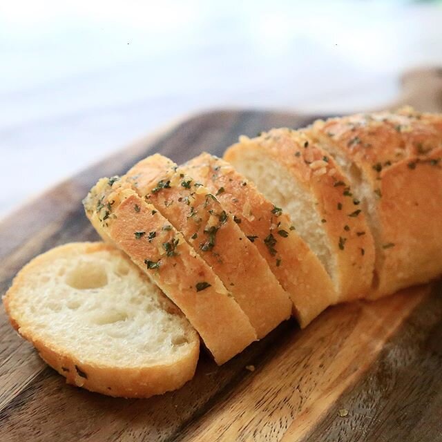 Sprinkled with parsley, this slightly savoury sea salt &amp; garlic ciabatta is perfect as sandwiches, for soup dipping or as slices of bread snack during the day! Made with French mill wheat flour, natural leaven, cold-pressed extra virgin olive oil