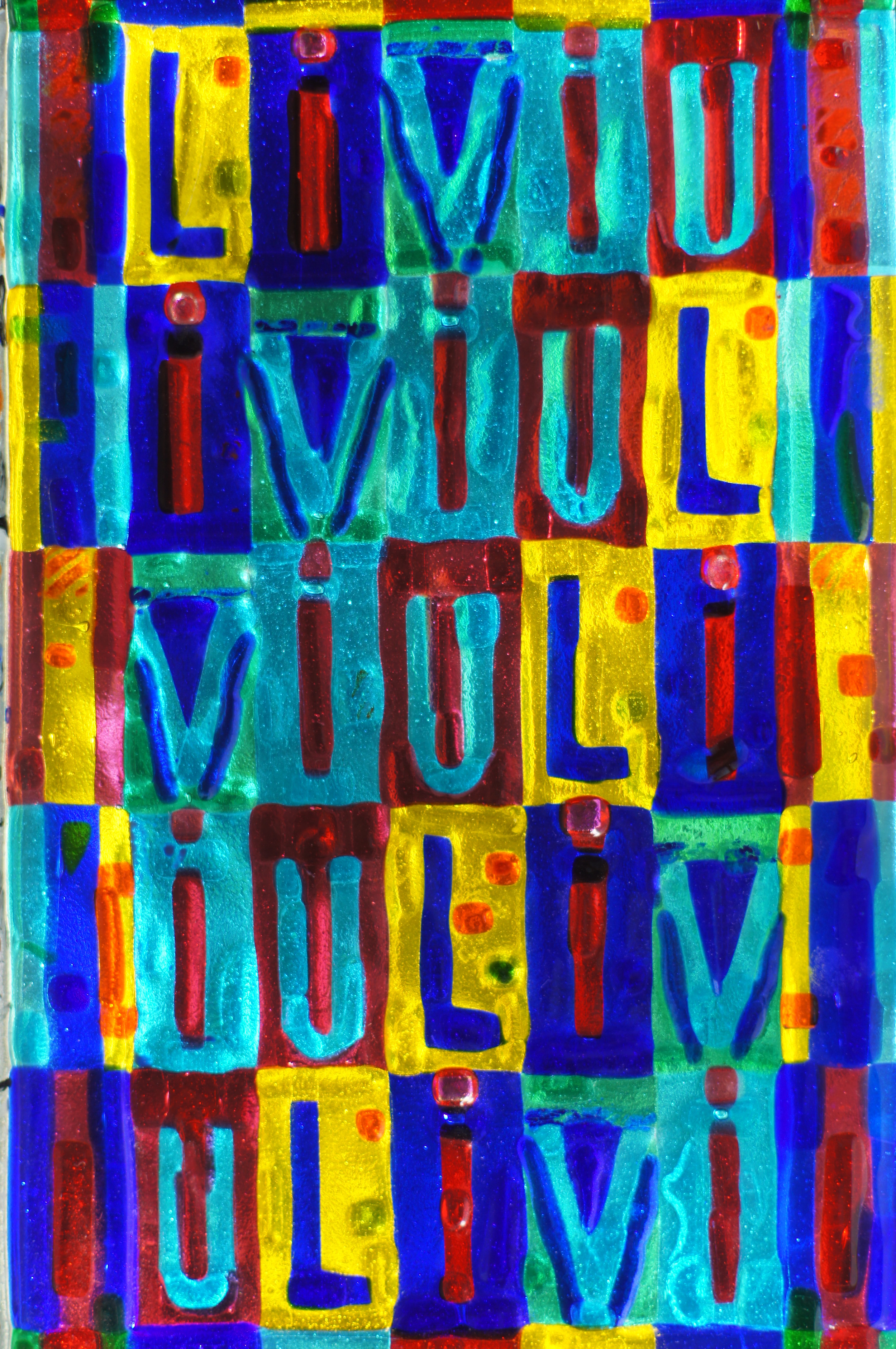   Play on the letters 'Liviu,' which are rotated around.&nbsp;    2010    Fused glass.  