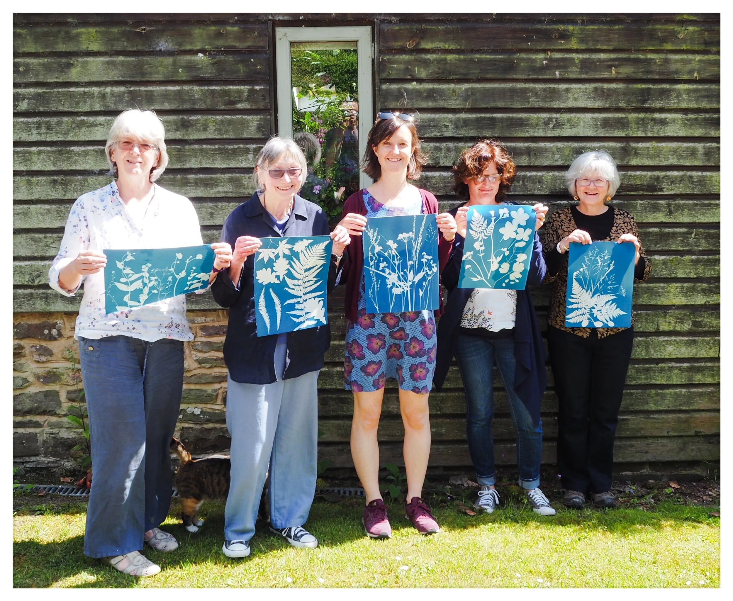 Students with some of their prints, June 2019.