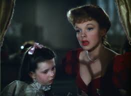Billedet viser Judy Garland og Margaret O'Brien i filmen Meet Me In St. Louis.