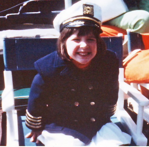 Here’s me with my captain’s hat and jacket on the tugboat my Great Grandfather named after me when I was 6. He said “Remember, you’re the captain of your own ship!” Marvelous advice.