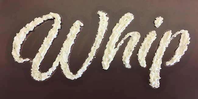 Whipped cream on paper