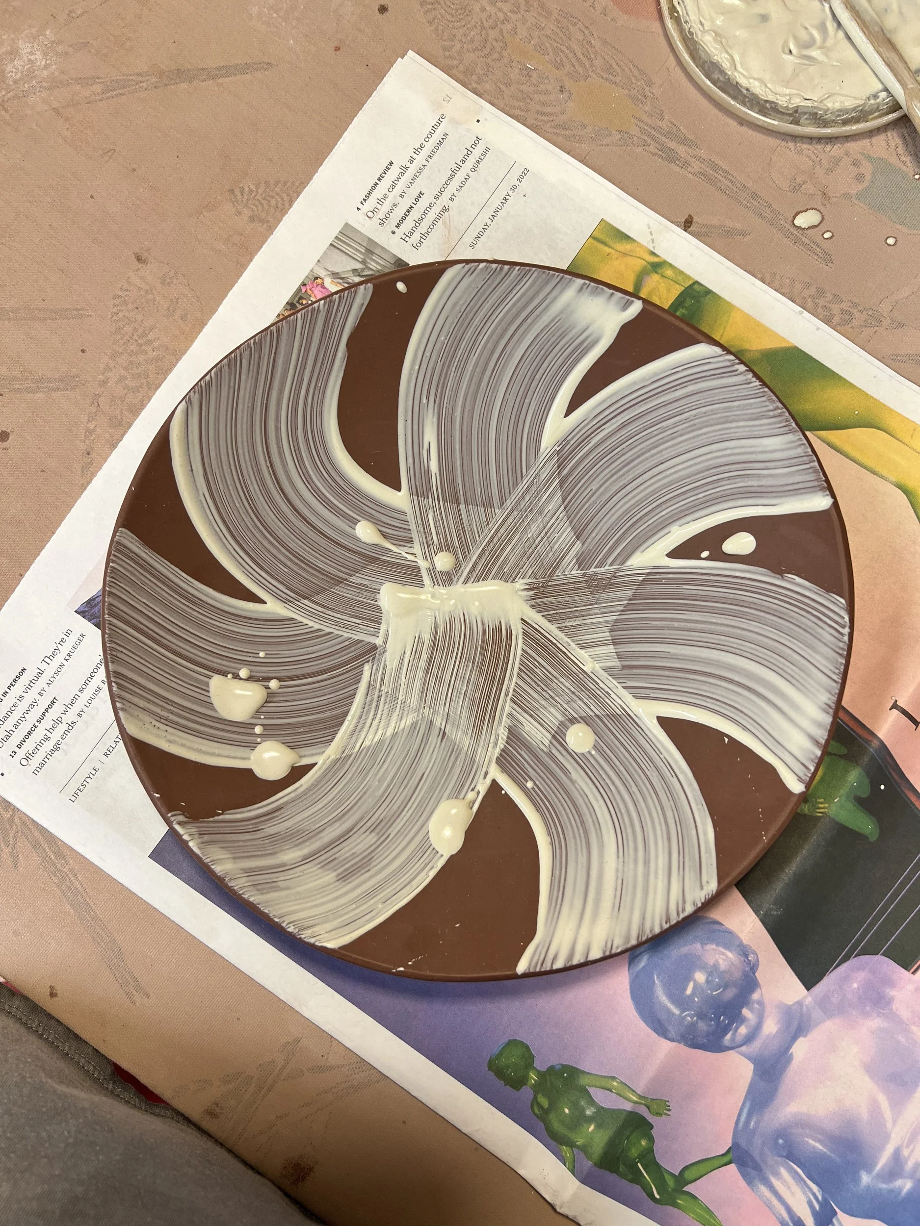 Slip-trailed platter in progress