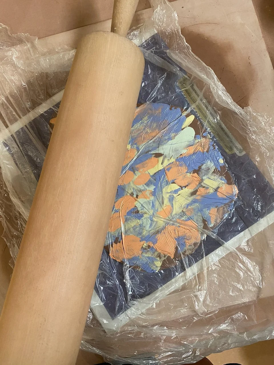 Colored slip rolled onto a clay slab · colored slip on stoneware