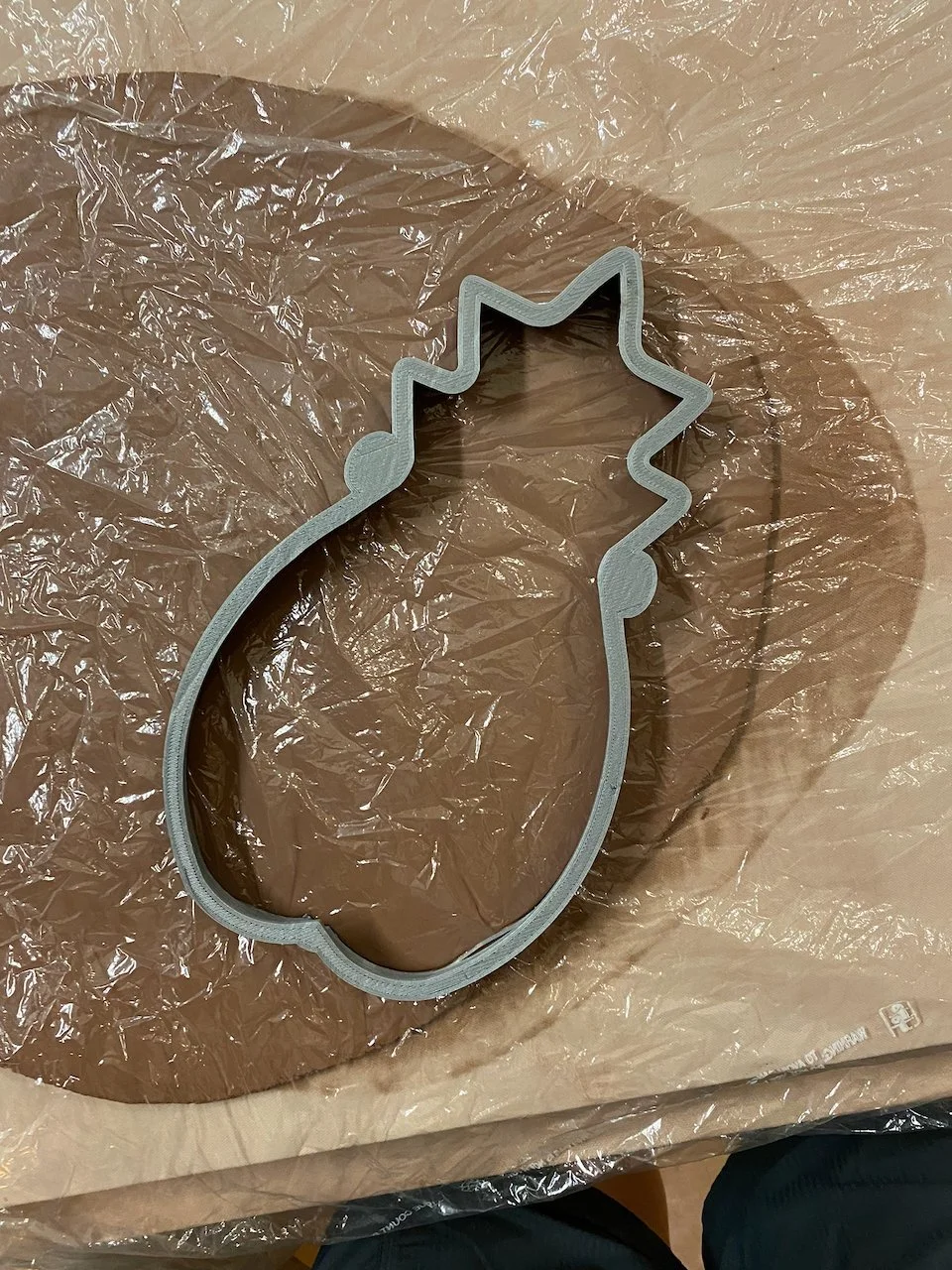 Cutting pineapple shapes from a slab · stoneware