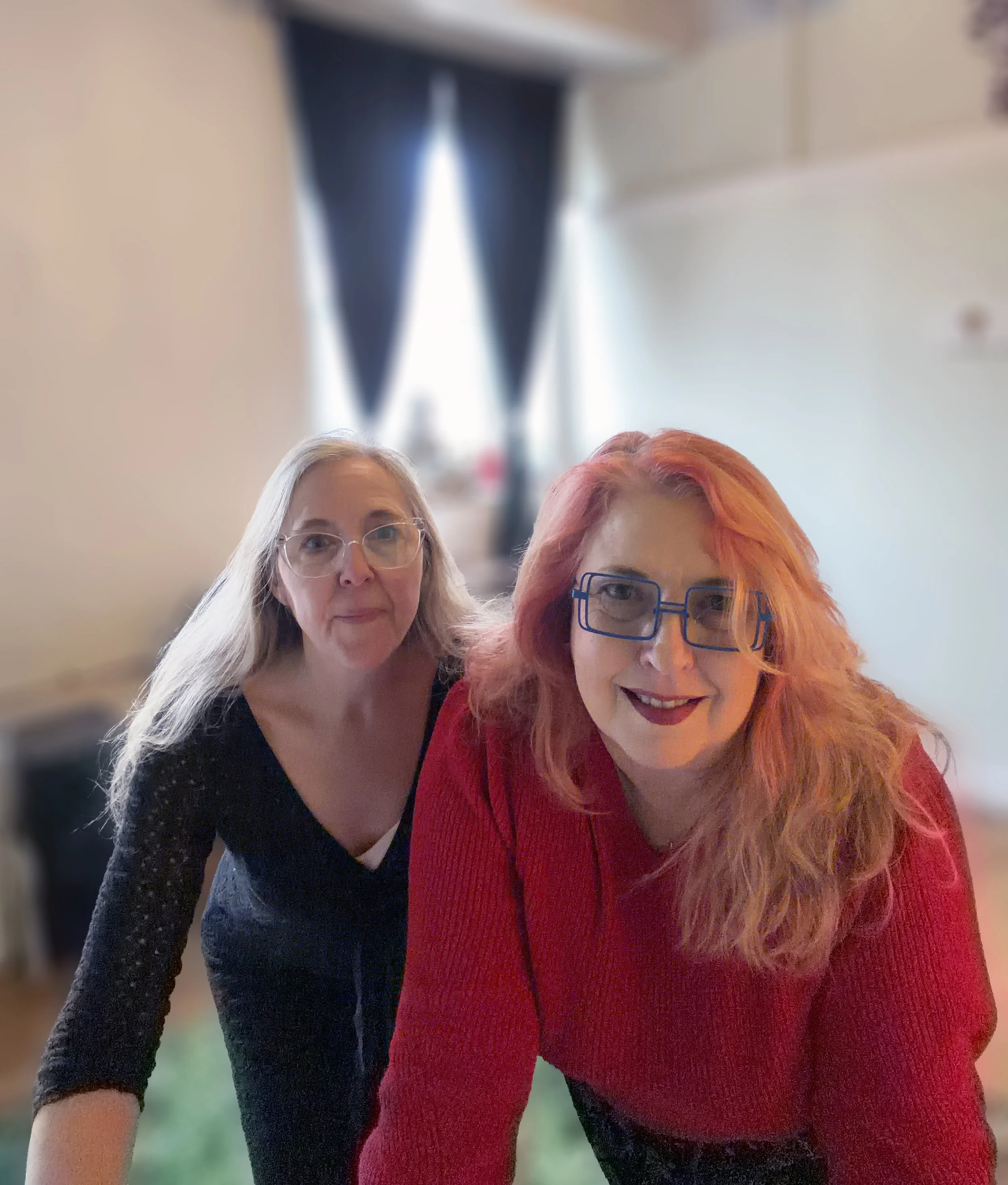 Image of two women standing next to each other.