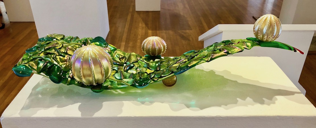 Nettle leaf and the Kamahamaha butterfly eggs. artist rendition . 29” x 6 “ blown glass, fused and slumped glass. 2018 Rick Strini
