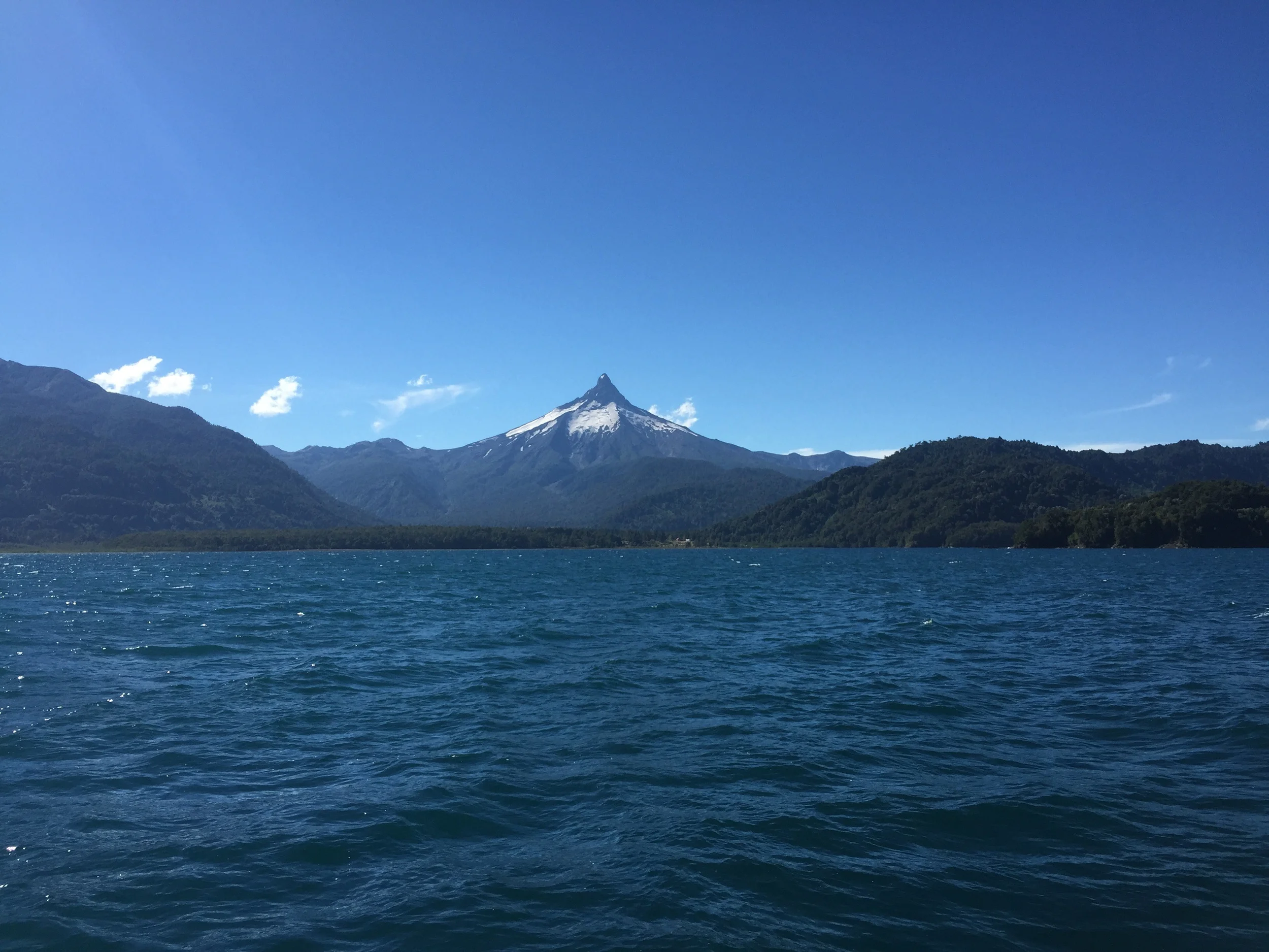 On board boat number three, and deep into Chile. This was the first volcano we saw, and it had eroded into this jagged peak like appearance.