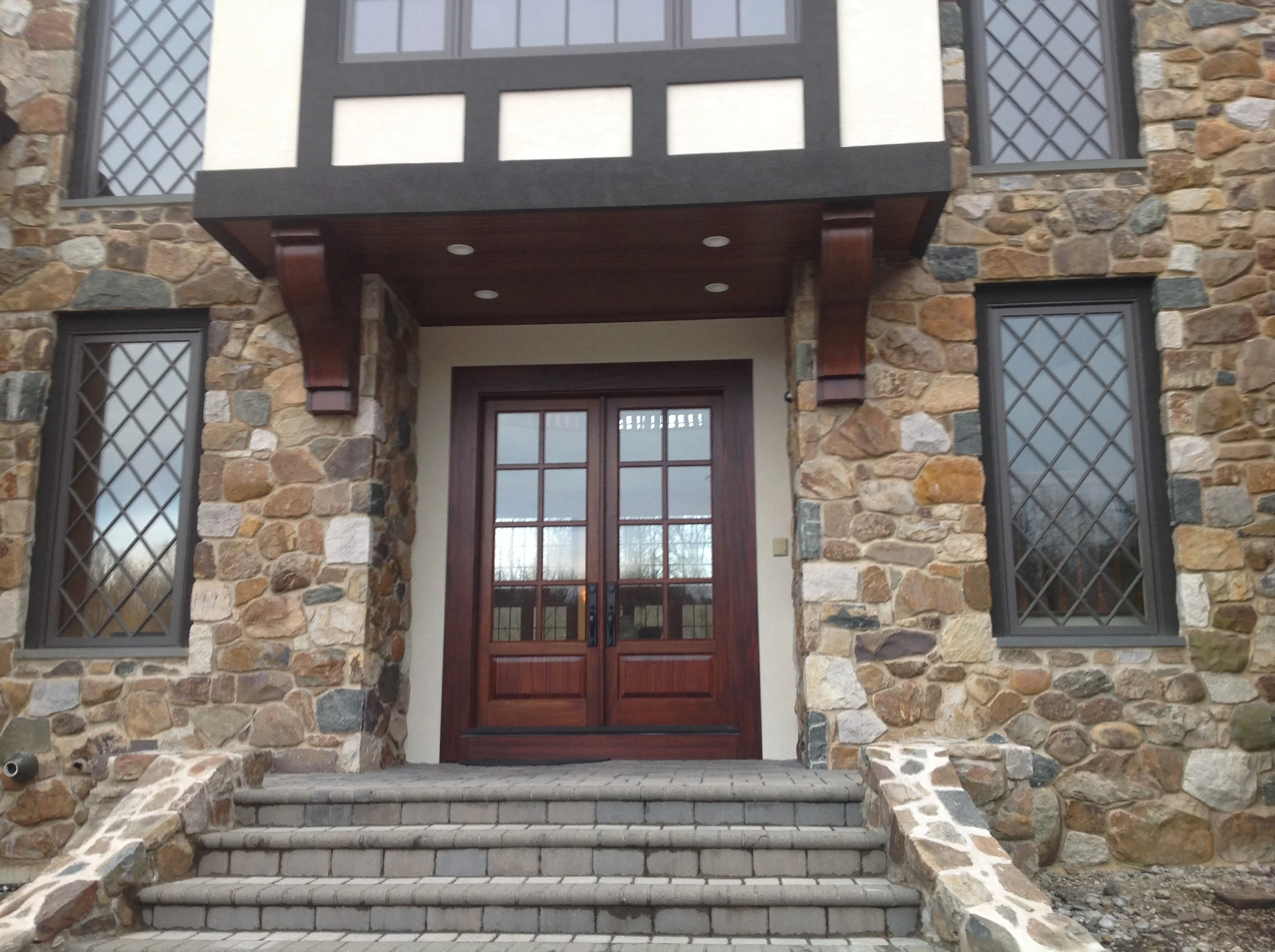  Beautiful entry doors with mahogany corbel brackets 
