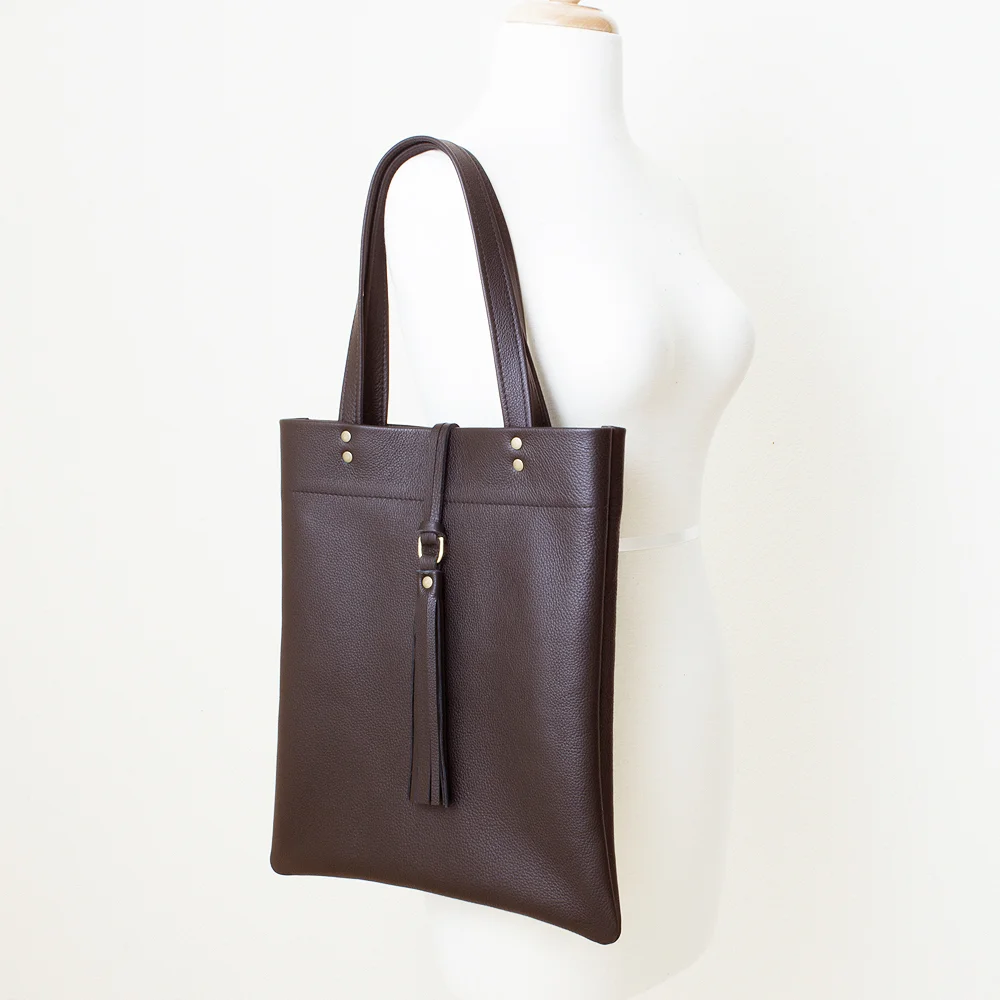 New Dark Brown Leather Tote with Center Tassle Side View.jpg