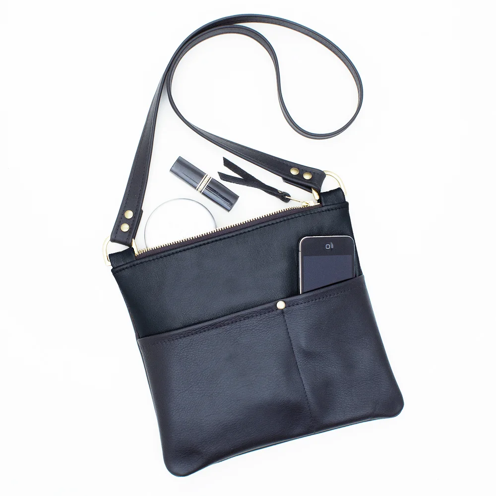 Black Cross Body Top View with Stuff.jpg