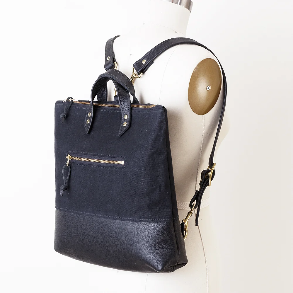 NEW Waxed Canvas and Leather Backpack Angled.jpg