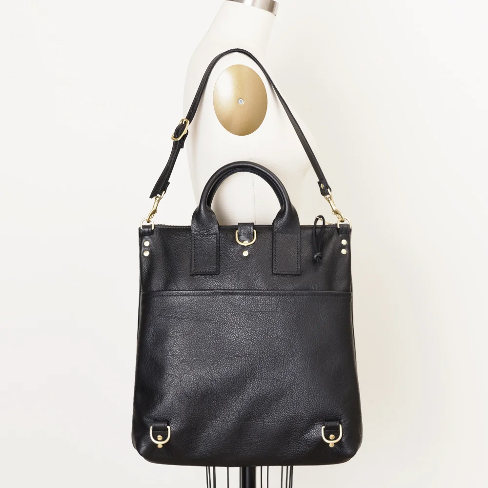 NEW Black Leather Convertible Backpack on Shoulder Reverse.jpg
