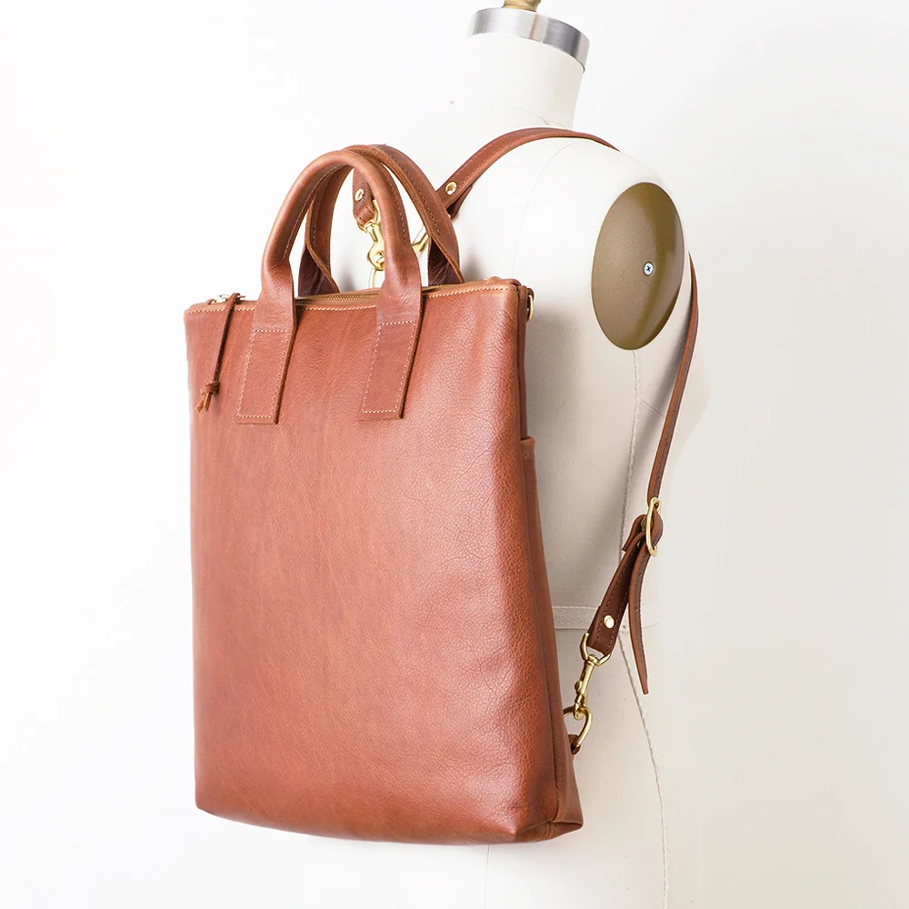 NEW Brown Leather Convertible Backpack Angled Darker copy.jpg