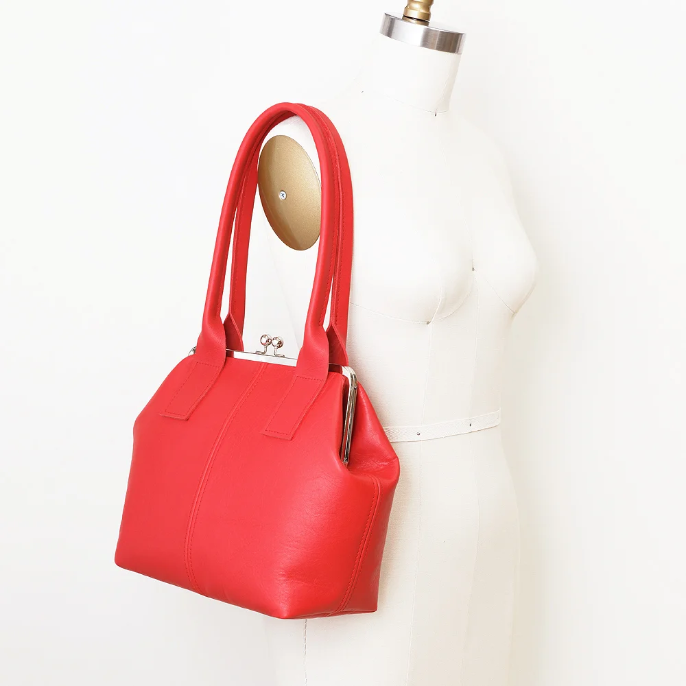 Large Red Leather Kiss Lock on Mannequin.jpg