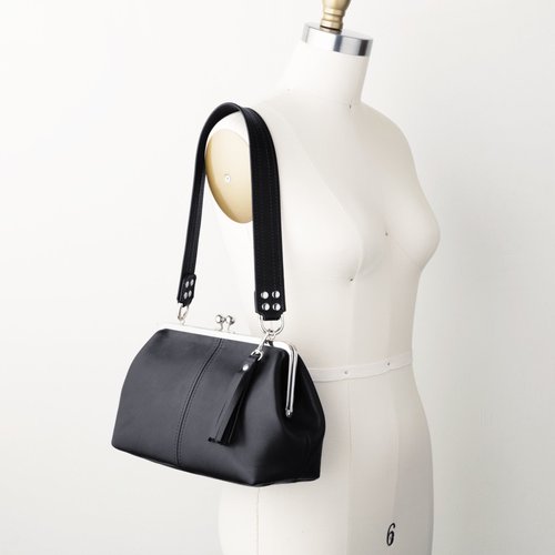 Mid-Size Kiss Lock Handbag with Multiple Strap Options