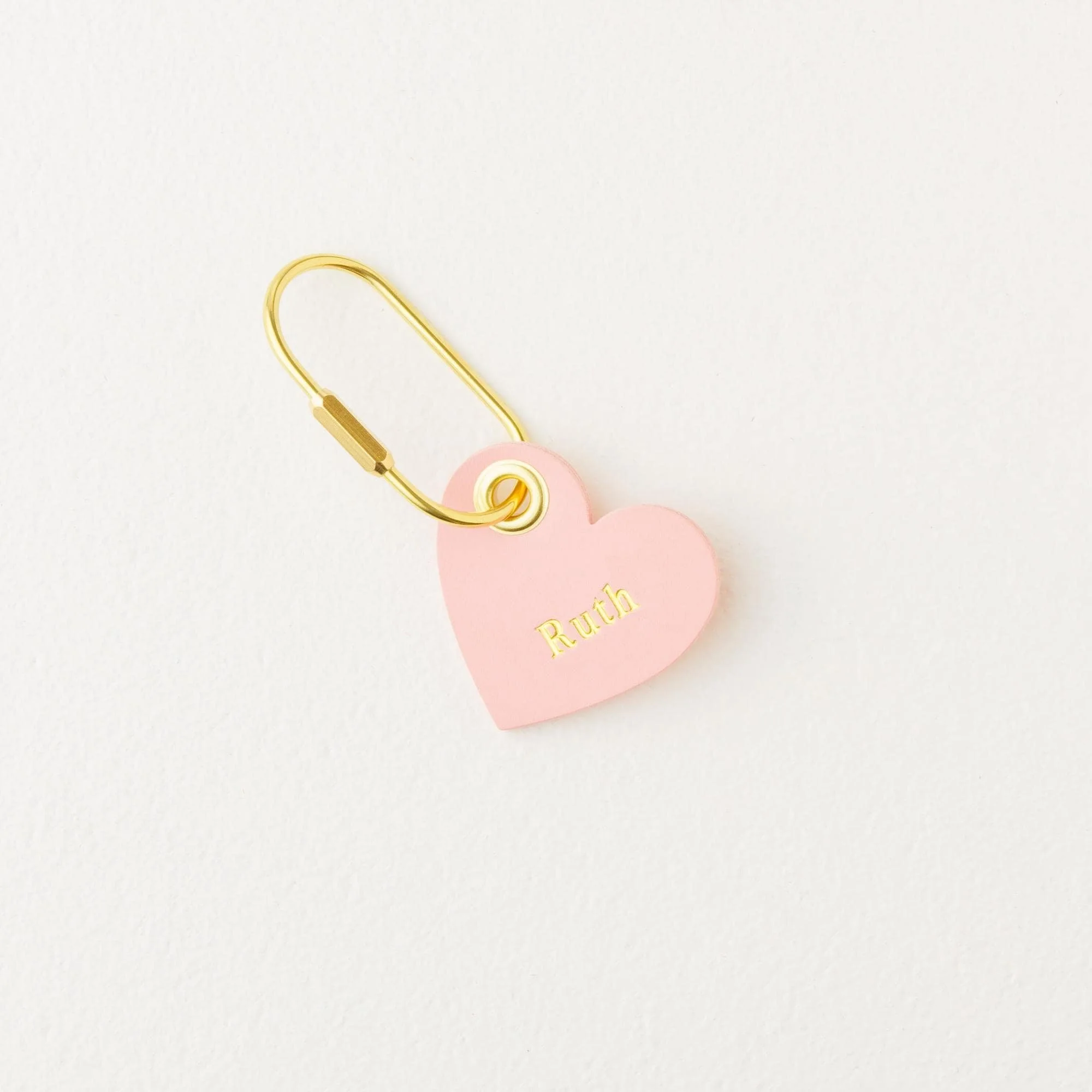 Personalized pink heart shaped leather purse charm / keychain with gold finish hardware.
