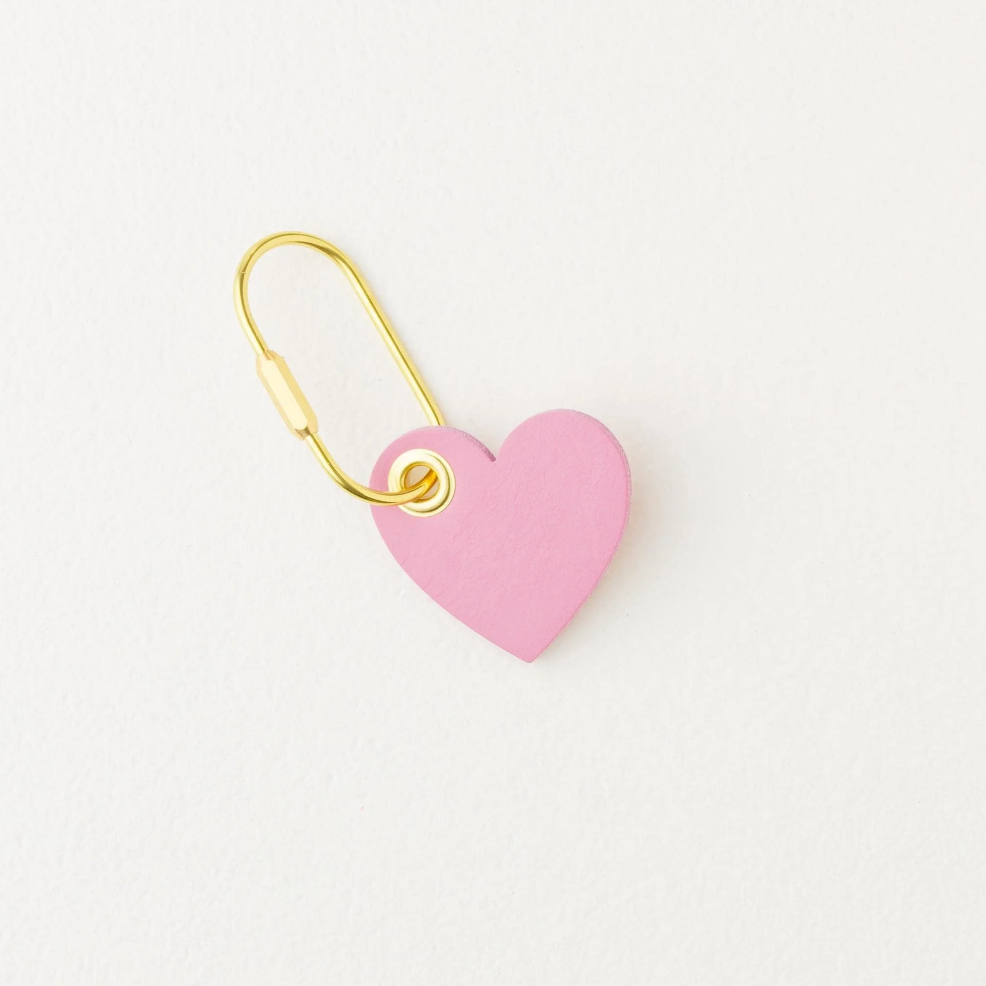 Purple heart shaped leather purse charm / keychain with gold finish hardware.