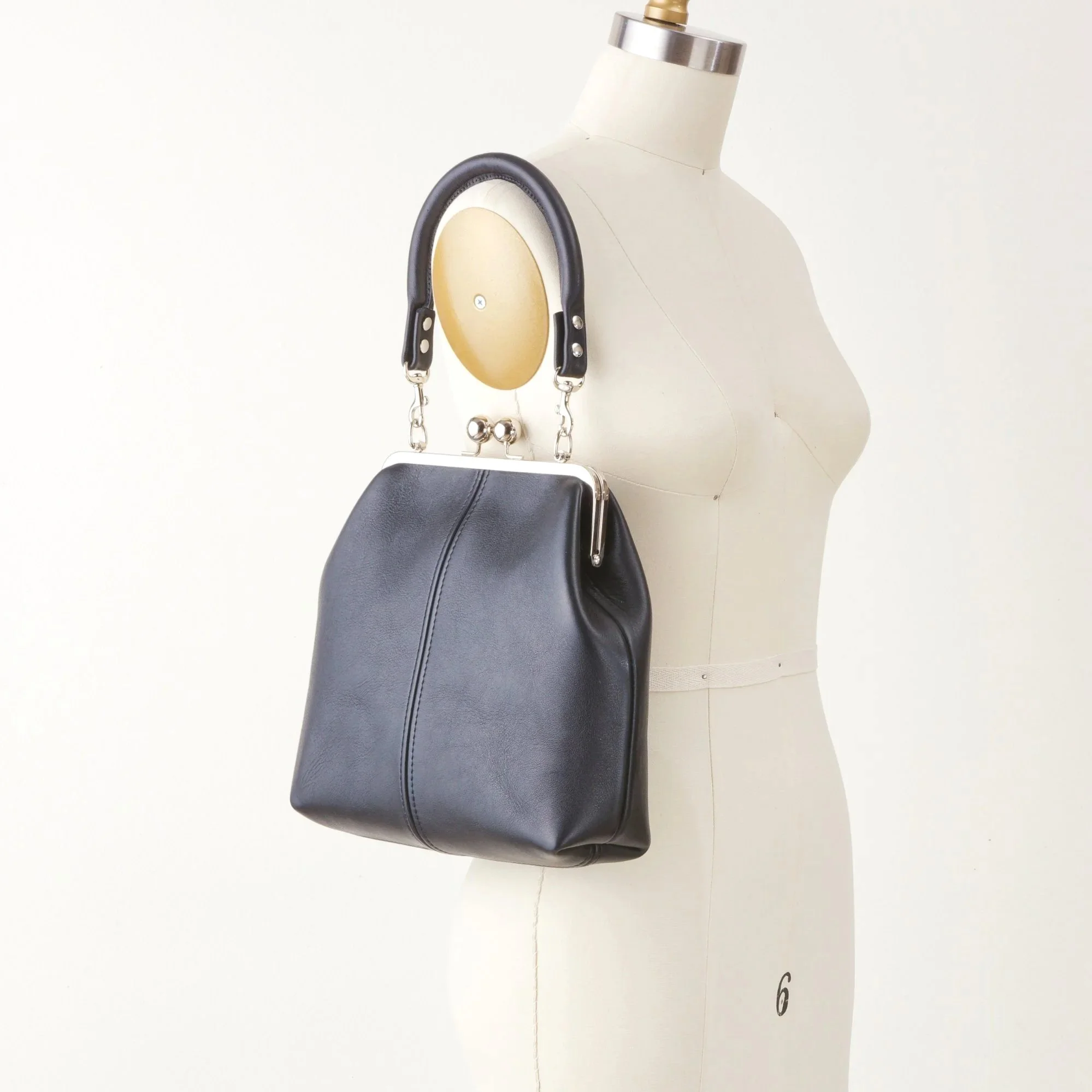 8+inch+Frame+Kiss+Lock+Bag+with+Rolled+Leather+Strap+Strap.jpg