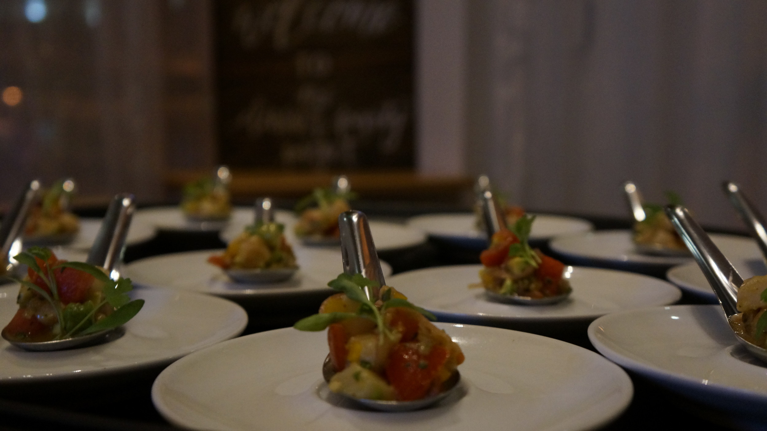 White Fish Ceviche - Escolar: watermelon, red onion, cherry tomato, yellow bell pepper, cilantro, sriracha. The escolar is cured in a combination of lemon and lime juice, and sriracha. 