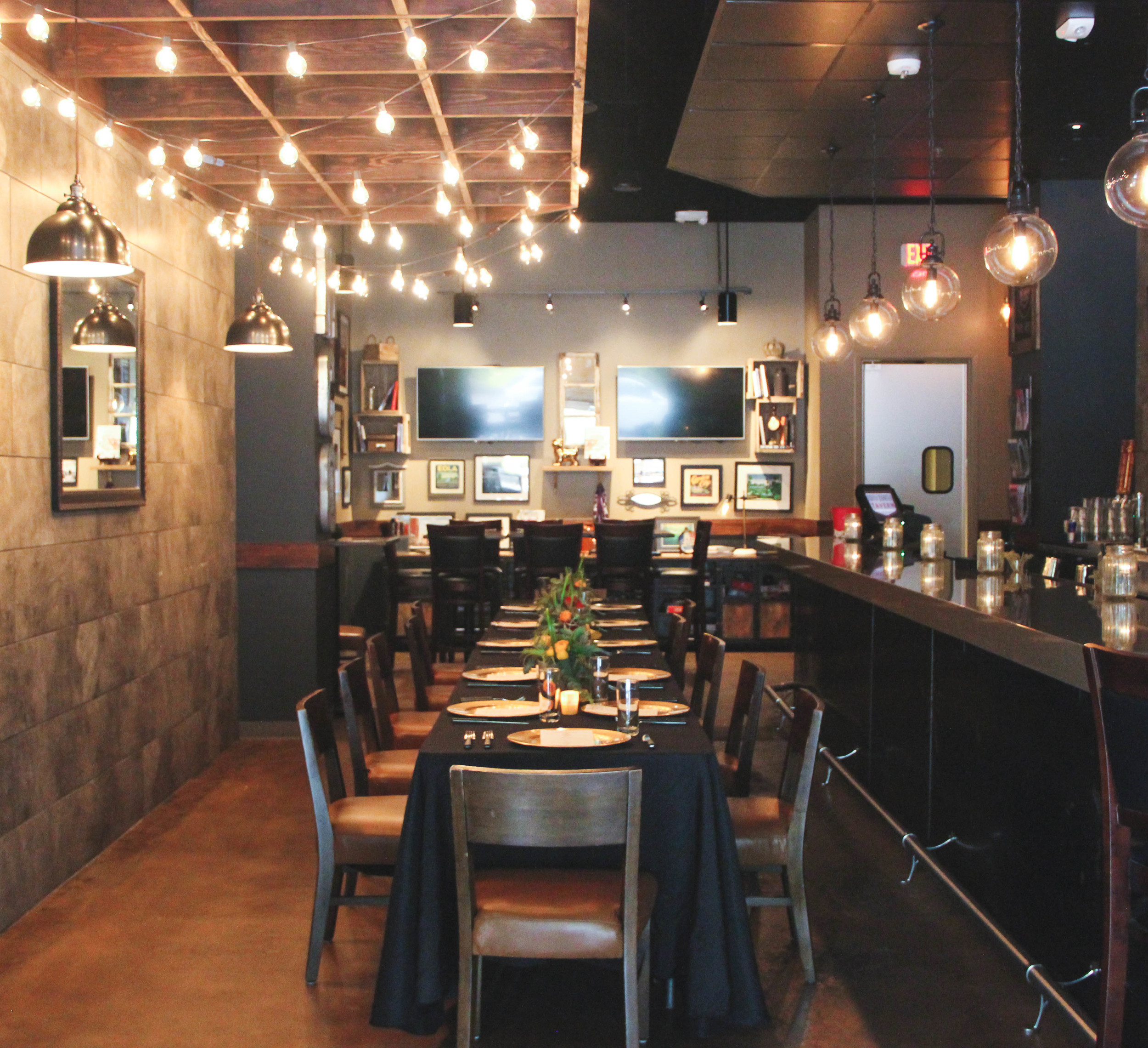 Table set for 12 at The Bar Room. Ready for all the delicious food coming our way. Makes for a Great place to Host an Event!