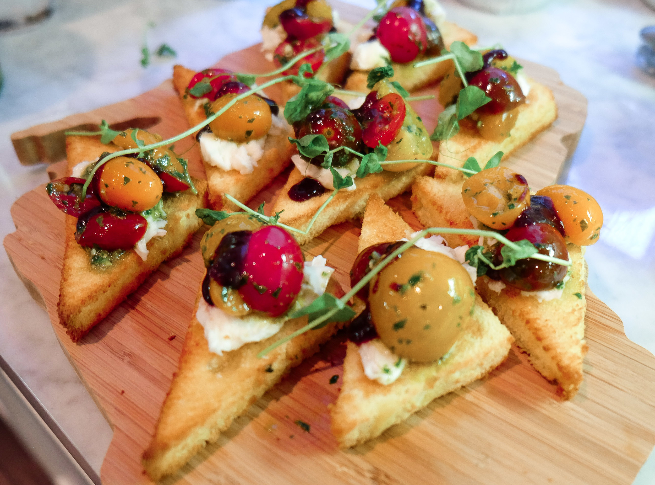 Cherry Tomato Bruschetta: Basil Marinated Cherry Tomatoes, Burrata, Olde Hearth Toasted Challah, Balsamic Gastrique