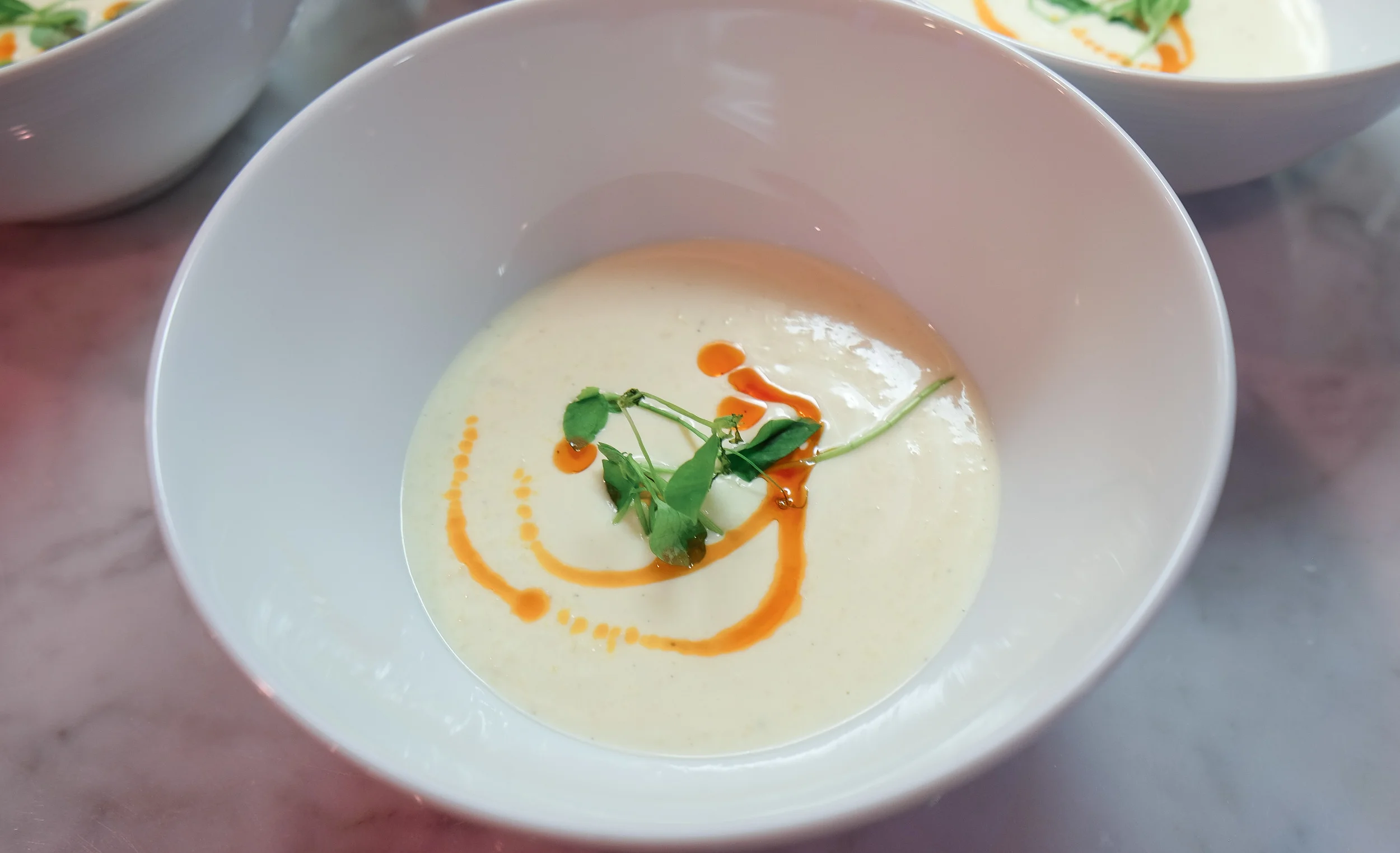 Summer Peach & Ginger Bisque: Carmelized Organic Peaches, Dakin Dairy Cream, Pea Tendril Garnish