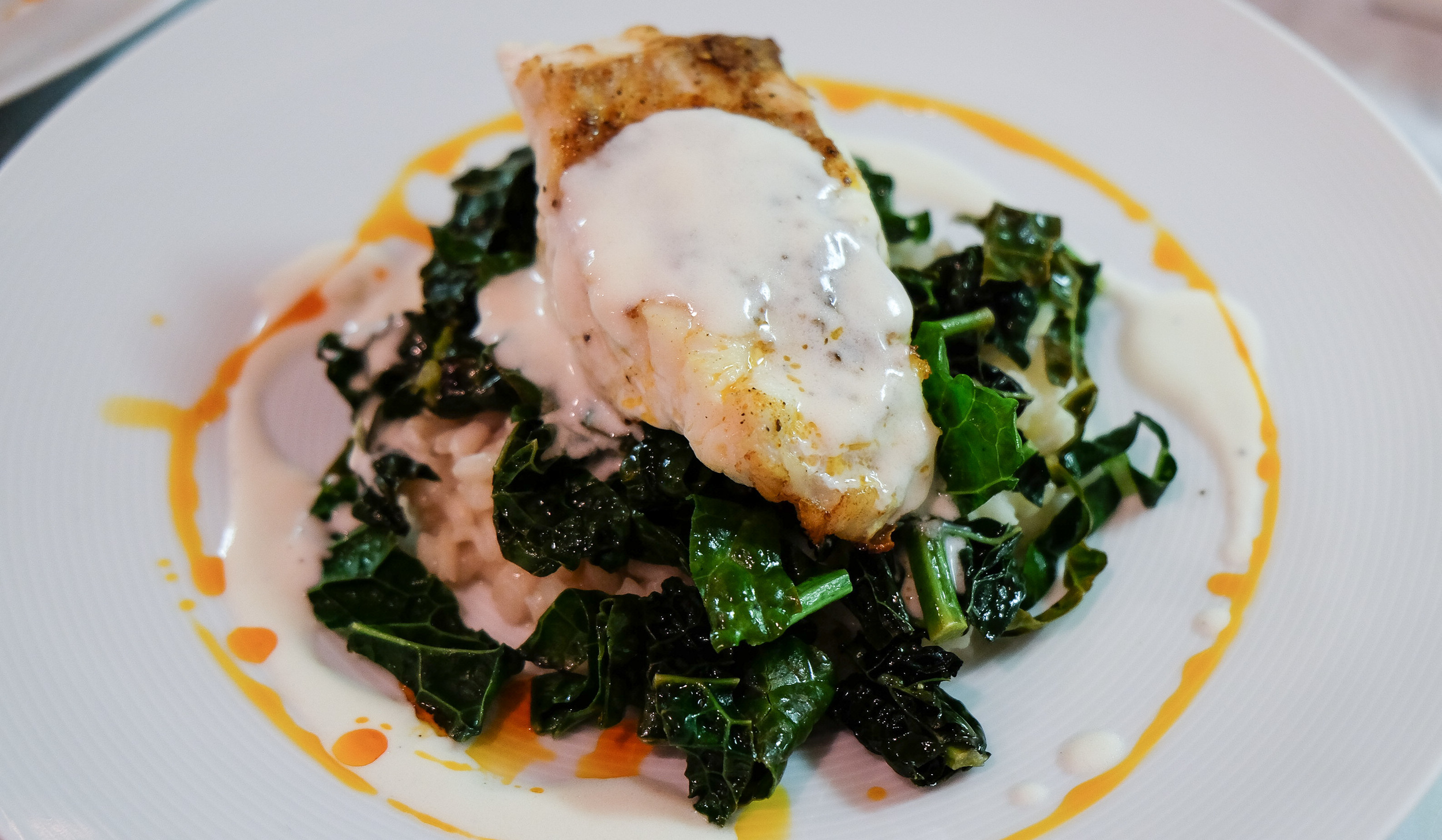 Cast Iron Seared Florida Red Grouper, Lemongrass Ginger Risotto, Sugar Top Farms Braised Kale, Coconut Lime Buerre Blanc