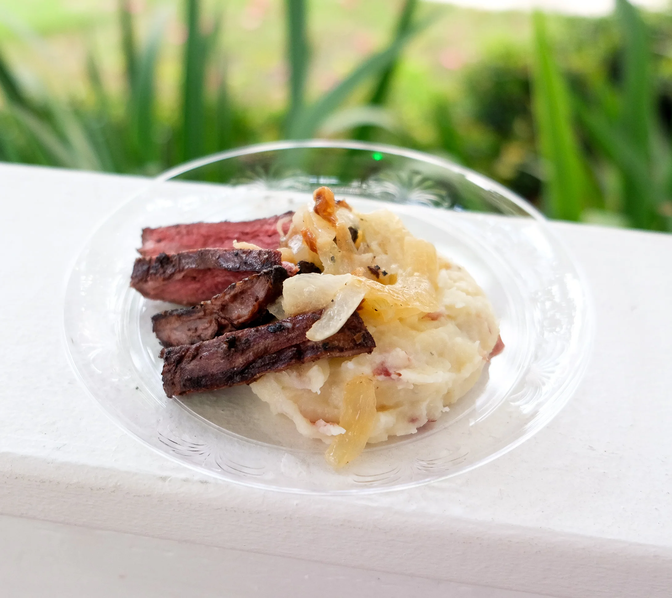 Bourbon Glazed Skirt Steak with Mashed Potatoes & Caramelized Onions