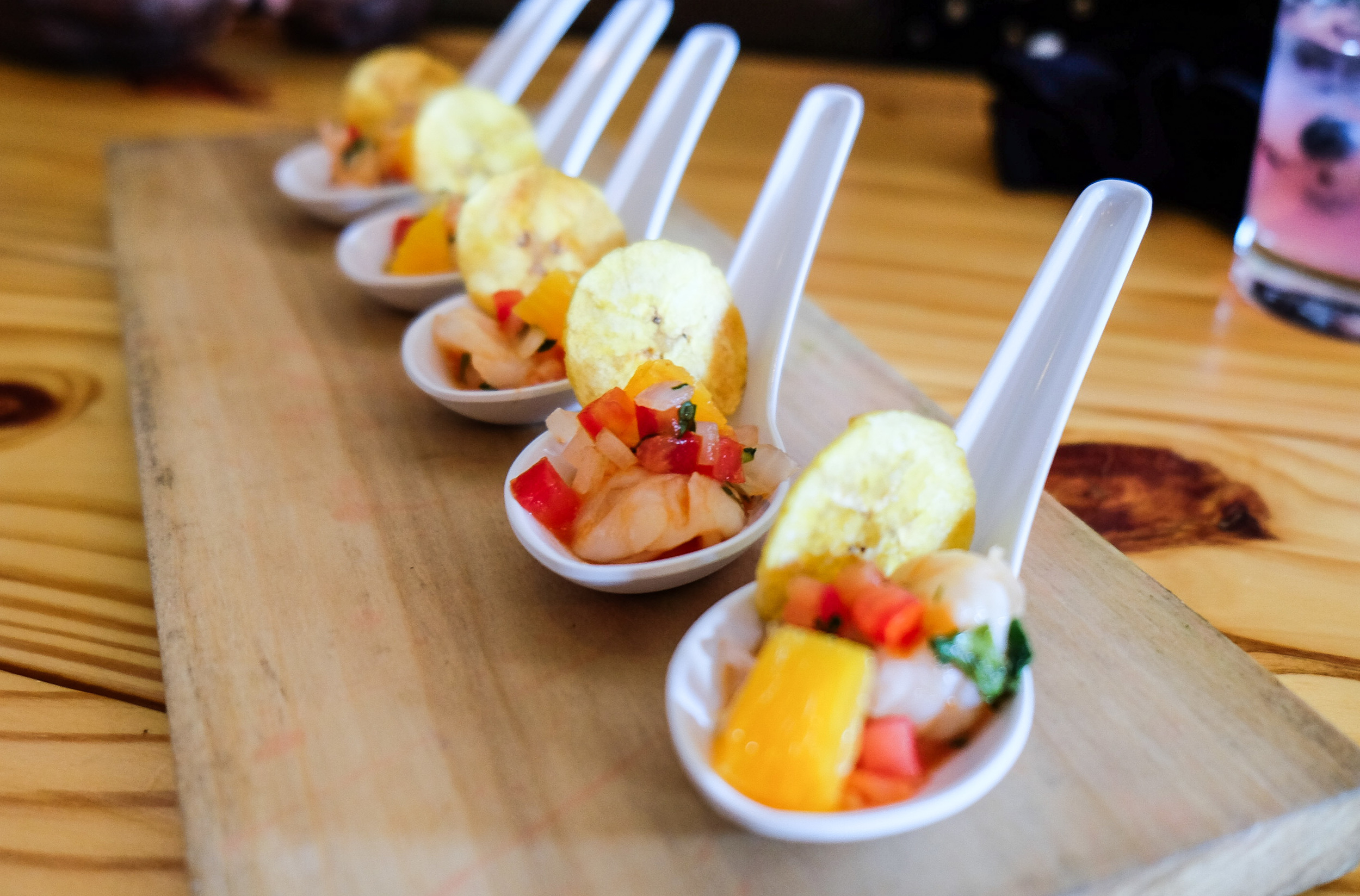 Black Rooster Ceviche: Local Shrimp, Red Bell Pepper-Tomato Broth, Onion, Cilantro, Orange