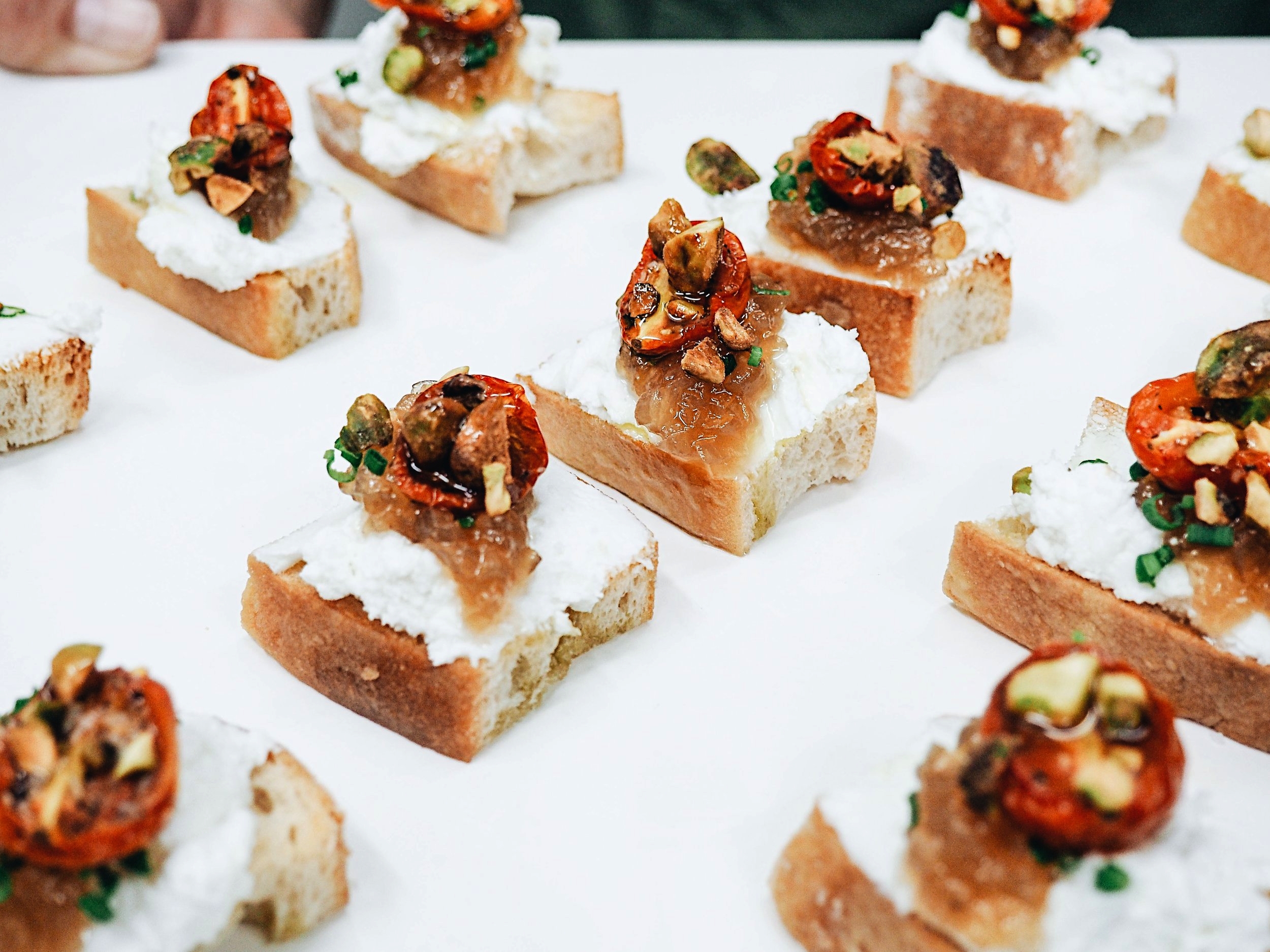 Whipped Goat Cheese with Roasted Tomatoes, Shallot Jam and Pistachios