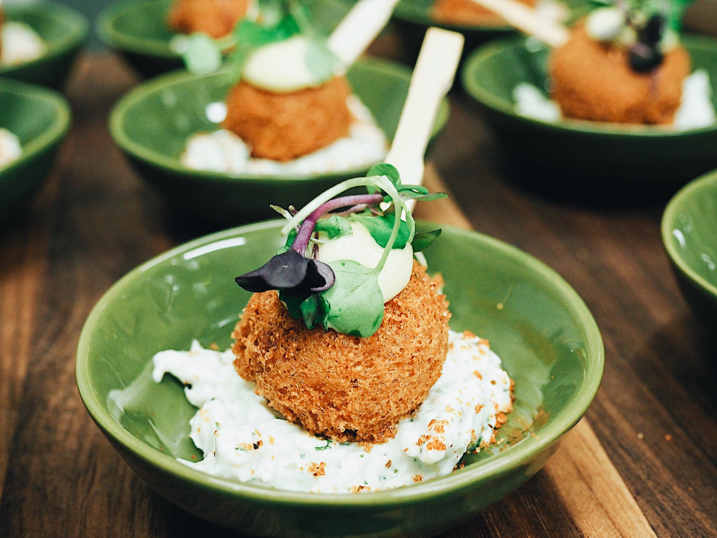 Hushpuppy with Lump Crab Aioli, Corn Puree and Louisiana Rub