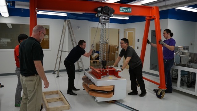 Hoisting the magnet off its wheels