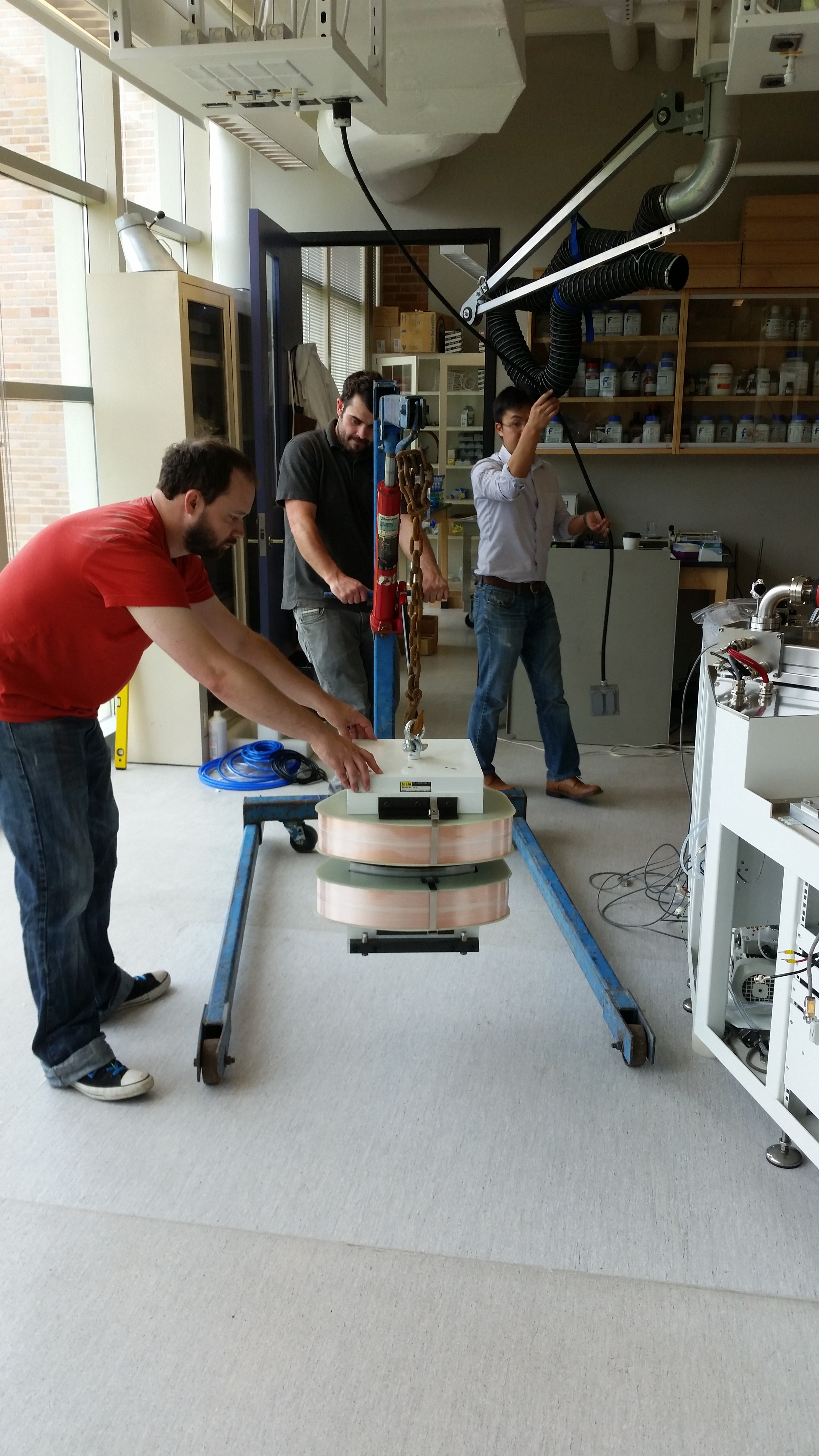  Thankfully Clint, from Jerry Dickens' lab, was there to help stabilize the magnet as we got it into position.  Photo by Ian Mellor-Crummey. 