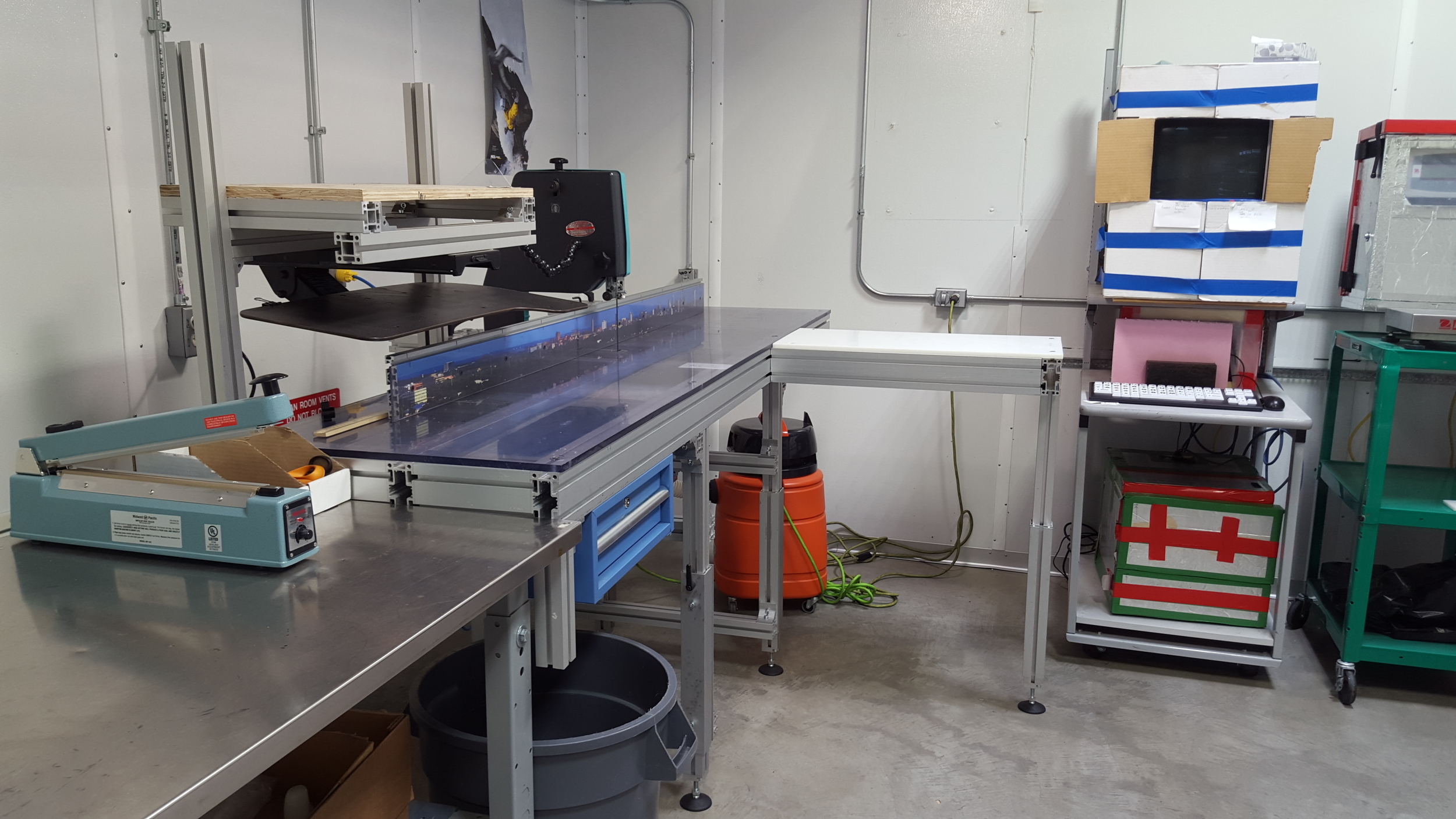 Our ice-cutting station in the "warm" room. Those cardboard boxes on the right are makeshift insulation for the computer, which otherwise wouldn't work at these temperatures.