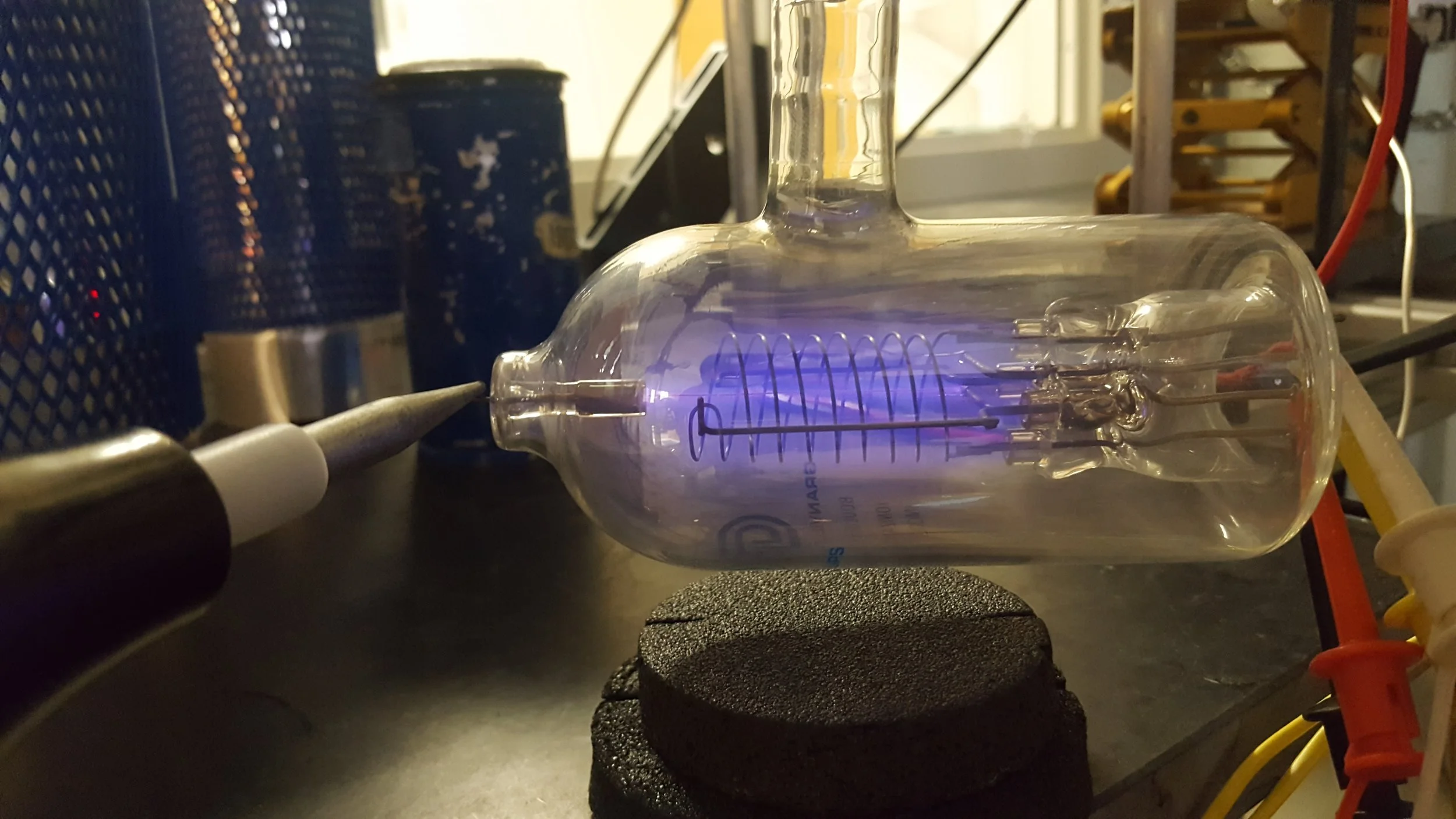 Simulating upper-atmospheric chemistry to determine its effects on isotopic composition.